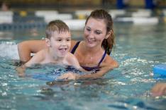 Mother and child swim lesson